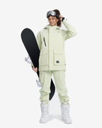 Women's Sage Green baggy ski jacket detail and snowboard styling – HIGH EXPERIENCE