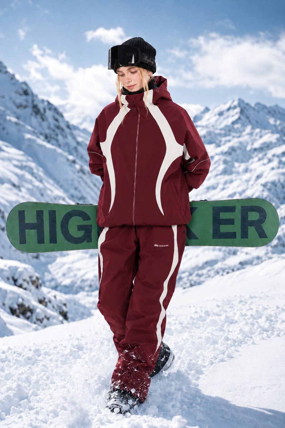 Street style original female model in burgundy snow outfit