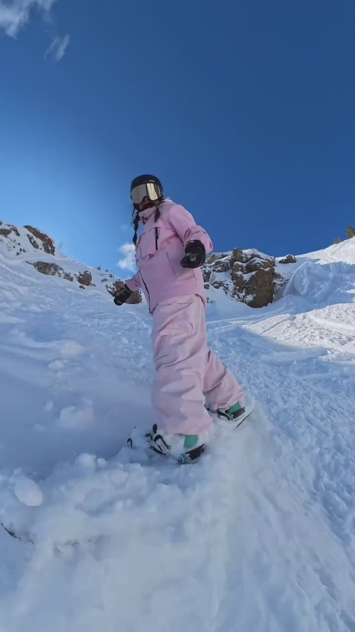 HIGH EXPERIENCE pink ski outfit riding on the mountain